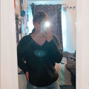 V-neck green sweater